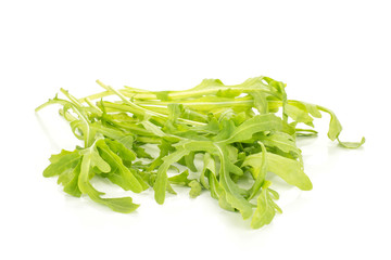 Fresh arugula green rucola leaves isolated on white background.