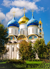 Segiyev Posad, Russia - August 30, 2012: View of Assumption Cathedral and Belltower at Holy Trinity St. Sergius Lavra on a sunny day.