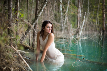 Fototapeta premium Portrait of hot sexy girl in the river