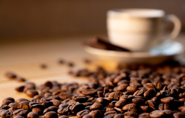 Coffee beans  and a cup of coffee