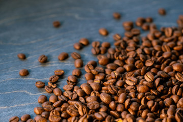 Coffee beans on wooden background