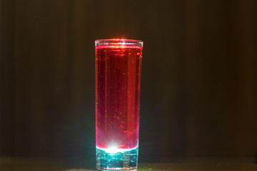 abstract single red cocktail on bright light