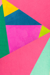 Fototapeta premium Geometric background of wall with bright tones. pop art style
