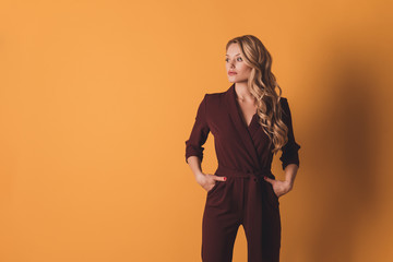 Portrait with copyspace, empty place of minded ponder concentrated woman in formal wear holding...