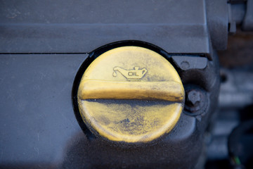 An oil filler cap on a car's engine