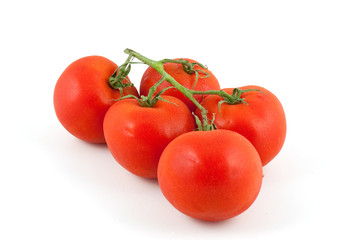Fresh red tomatoes isolated on white background