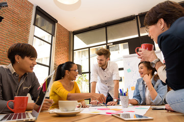 Multi ethnic business person group in casual suit discuss about internal meeting project in modern office. Project and Business concept.