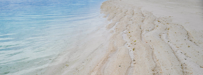 Summer concept , Beach white sand and turquoise sea color dimention ratio use for facebook cover page include copyspace for add page name text or graphic