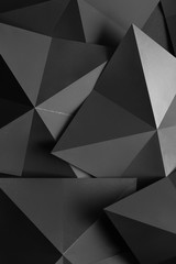 Fototapeta premium Dark composition with black geometric shapes, abstract background