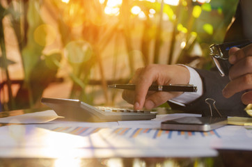 Business man using a calculator