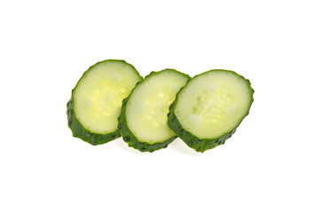 sliced green fresh cucumber on white background