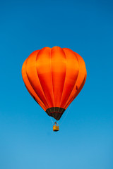 Colorful hot air balloon fly over the blue sky