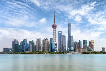  Het Pudong-centrum van Shanghai, China, met de moderne gebouwen en wolkenkrabbers © moofushi