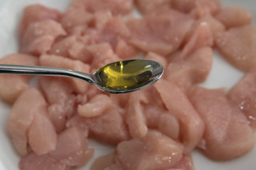 Speiseoil auf dem L&ouml;ffel 