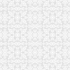 Seamless grey background with white pattern in baroque style. Vector retro illustration. Ideal for printing on fabric or paper.