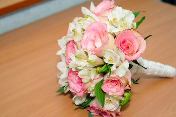 Beautiful wedding bouquet of white and pink roses.