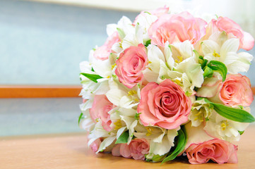 Beautiful wedding bouquet of white and pink roses.