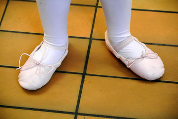 feet of a dancer with shoes