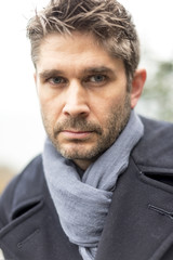 Obraz premium Middle Age Man with blue eyes and striking features