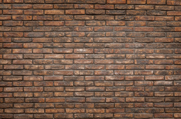 Dark red brick wall background, wallpaper. Dark Red bricks pattern, texture.