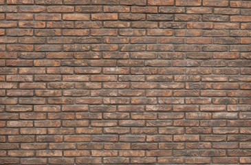 Orange brick wall background, wallpaper. Orange bricks pattern, texture.