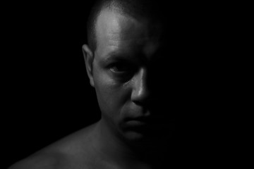 Portrait of the man. Half face man.