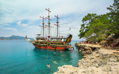 Fototapeta na wymiar ancient pirate ship by the shore. Turkey