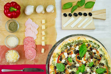 Fresh baked italian pizza being eaten by a girl at a restaurant