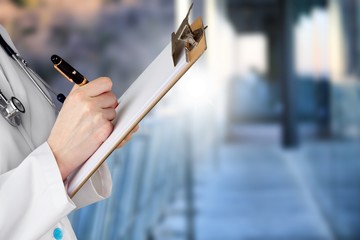 Doctor at hospital working with tablet