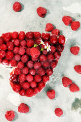 raspberry cake and many fresh raspberries.