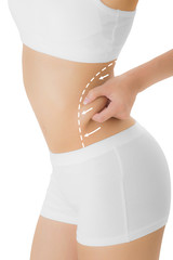 Woman grabbing skin on her hip with the drawing arrows, Lose weight and liposuction cellulite removal concept, Isolated on white background.