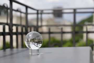 Lens ball on a balcony with a beautiful view at the Mill Colonnade (Mlýnská kolonáda) in...