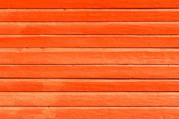 Orange painted wooden background, texture or wall