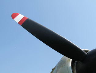 An Engine Propeller on a Large Vintage Aircraft.
