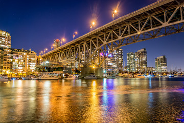 Granville Bridge Vancouver and Downtown nightlights in blue hour