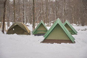 tents in winter snow