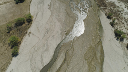 Dried up river bed among the farm fields in the mountainous province Philippines, Luzon.Drought....