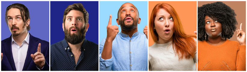 Group of cool people, woman and man happy and surprised cheering expressing wow gesture pointing up