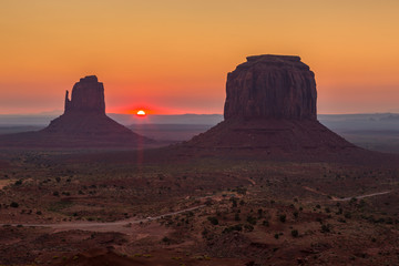 View on Merrick, East and West Mitten Butte and sunrise.