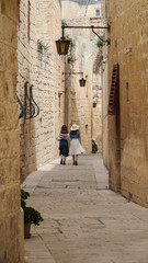 Fototapeta na wymiar Malta. Narrow medieval streets of old Mdina. Mdina is a popular tourist destination in Malta.