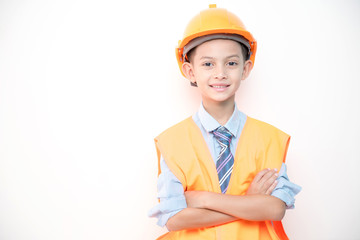 Young boy engineer isolated in white. Handsome early teenage boy portrait with engineering cloth. Confident look pose.