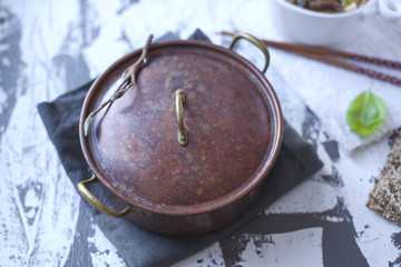 Vintage saucepan. Wabi sabi style. Minimalism.