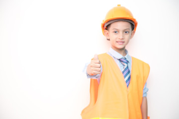 Young boy engineer isolated in white. Handsome early teenage boy portrait with engineering cloth. Confident look pose.
