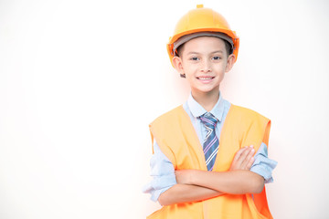 Young boy engineer isolated in white. Handsome early teenage boy portrait with engineering cloth. Confident look pose.