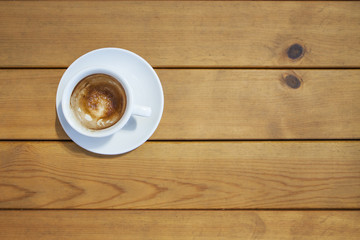 Coffee cup on a wooden table