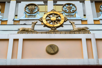 Wheel of Dharma on temple wall close