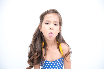 Young girl isolated white. Pretty early teenage girl portrait. Happy naughty pose.