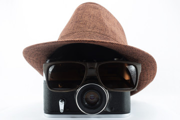 photographer - detective, on white background antique camera with glasses and hat
