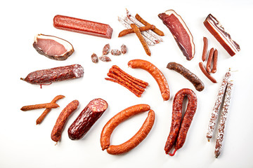 Large selection of spicy sausages in a flat lay