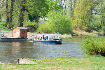 Fototapeta na wymiar People onto boat on the river. Czech, Prague. 